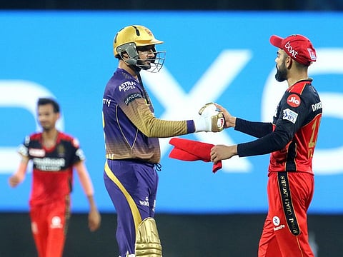 Virat Kohli captain of Royal Challengers Bangalore and Harbhajan Singh of Kolkata Knight Riders after the match.