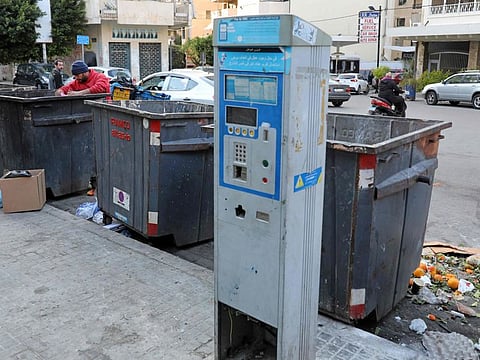 A broken parking meter is seen in the Lebanese capital Beirut on March 31, 2021. As Lebanon battles its worst financial crisis in decades, the local currency has lost more than 85 per cent of its value on the black market.