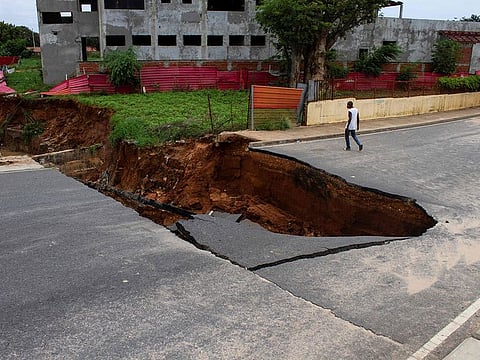 A general view of the Kamorteiro bridge that collapsed in the Talatona neighbourhood of Luanda, Angola, on April 20, 2021, after the heavy rains on April 19, 2021.