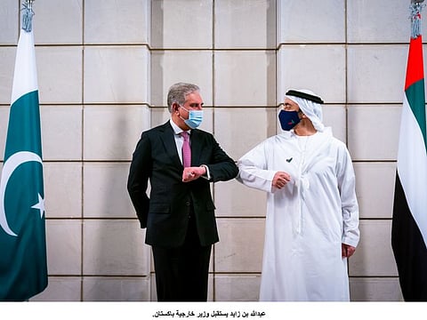 Sheikh Abdullah Bin Zayed receives Shah Mahmood Qureshi in Abu Dhabi on Monday.