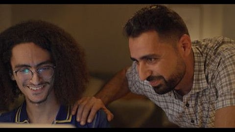 Father and son Ahmed and Mustafa dreaming of Canada