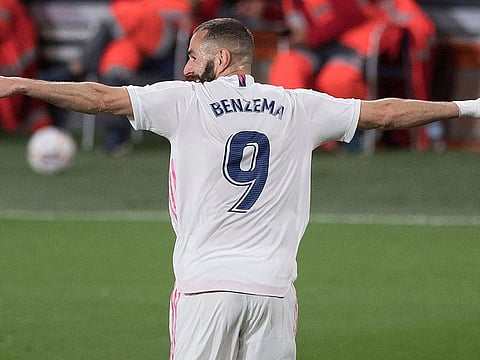 Real Madrid's French forward Karim Benzema celebrates.