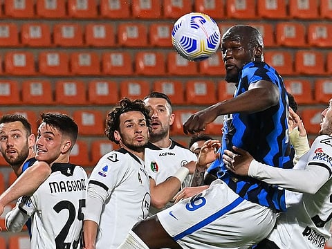 Inter Milan's Belgian forward Romelu Lukaku goes for the ball against Spezia