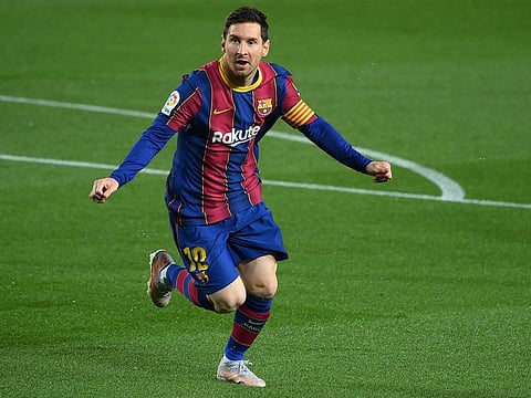 Lionel Messi celebrates after scoring.