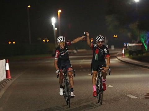 Jani Brajkovic wins the 75km Nad Al Sheba Cycling Championship alongside friend Vladimir Gusev