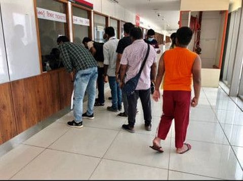 Passengers trying to book last minute tickets from Cochin International Airport in Kerala on Friday.