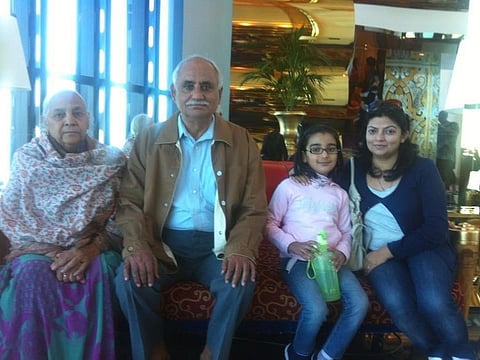 Aarti Bhardwaj with their aged parents, who live in Gurgaon, Haryana.