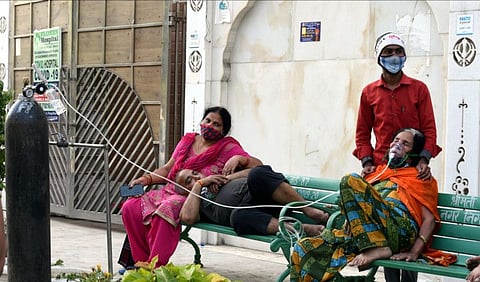 Ghaziabad: A COVID-19 patient receives free oxygen, provided by a Sikh organization at Indirapuram Gurudwara, in Ghaziabad, Saturday, April 24, 2021. (PTI Photo/Atul Yadav)(PTI04_24_2021_000194B)