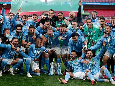 Manchester City celebrate four League Cups in a row