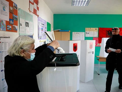 Voters cast their ballots during the parliamentary elections in Tirana, Albania.