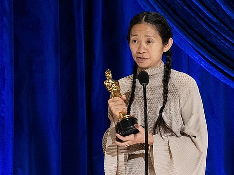 Chloe Zhao accepts the Oscar for Directing during the live ABC Telecast of The 93rd Oscars in Los Angeles, California, U.S., April 25, 2021.