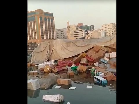 Cargo from the vessel floats in the Khalid lagoon after it capsized.