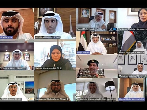 Sheikh Mansoor bin Mohammed bin Rashid Al Maktoum with officials of various entities