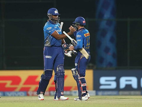 Quinton de Kock and Kieron Pollard of Mumbai Indians celebrate the win.