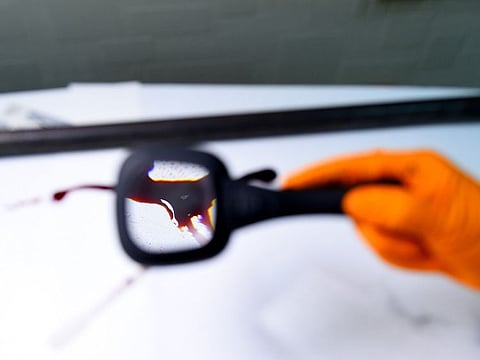 Sharjah Police's forensics laboratory tested 58,194 samples in 2020 to solve crimes.