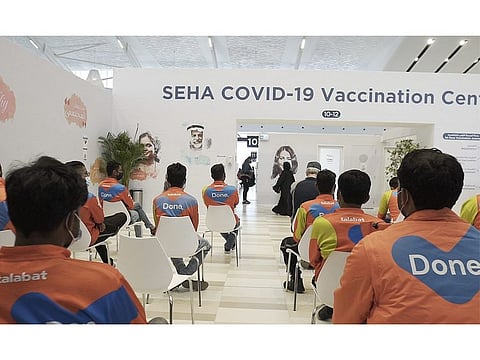 talabat delivery riders get their vaccines in Abu Dhabi and Al Ain