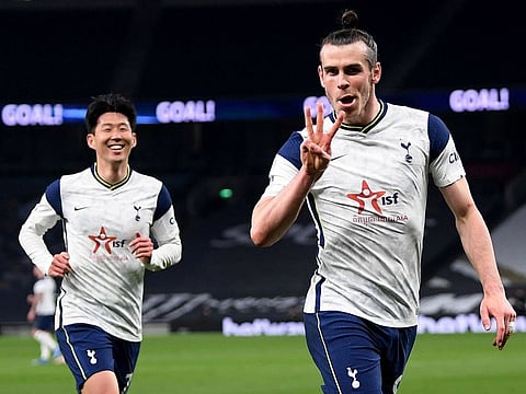 Gareth Bale celebrates a goal for Tottenham Hotspur with teammate Son Heung-min. Bale is heading back to Real Madrid where he played his best during Ancelotti’s first season in charge in 2013-14.