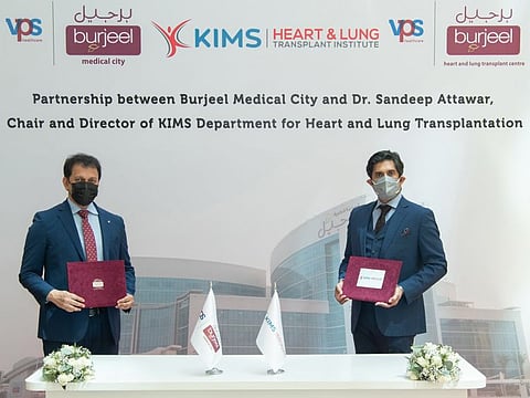 Dr Sandeep Attawar with John Sunil.