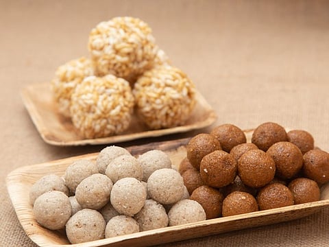 Bengali - Naru Narkel ladoos or coconut sweet dessert and sweetened puffed rice balls