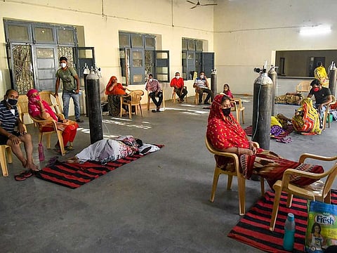 COVID-19 patients take oxygen at a relief centre in Ajmer, Wednesday, May 5, 2021.