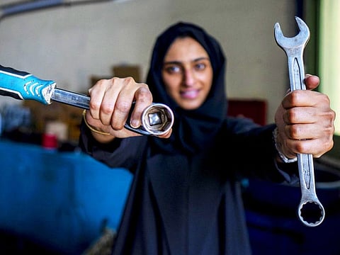 Huda Al Matroushi, the first Emirati female car mechanic, at her IMEX Car Service in Sharjah Industrial Area 1, Sharjah.
