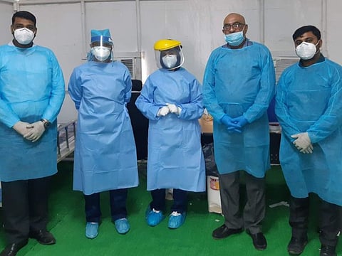 Dr Sanjay Paithankar with his team that collaborated with Dubai Health Authority and Dubai Police to conduct free screening of more than 300,000 blue-collar workers in Al Quoz and Dubai Investment Park.