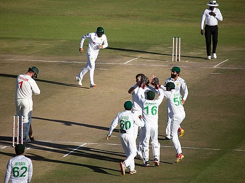 Pakistan players celebrate the wicket of Zimbabwe captain Brendan Taylor