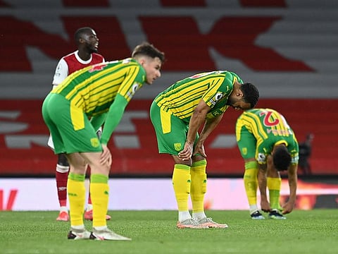 West Bromwich Albion's Matt Phillips and teammates look dejected after being relegated from the Premier League.