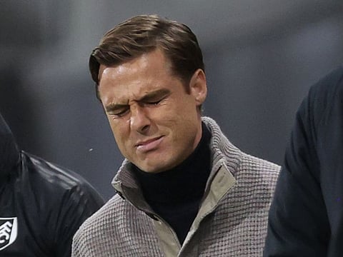 Fulham manager Scott Parker looks dejected.