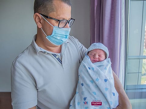 Zyad Salovm with Baby Daniel at Burjeel Hospital, Abu Dhabi. The little bundle of joy was born exactly at 12am weighing 2,770 grams.