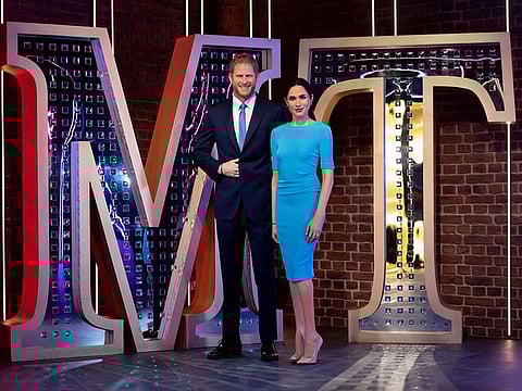 Figures of Britain's Prince Harry and Meghan, Duchess of Sussex, stand in their new position at Madame Tussauds.