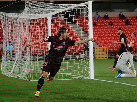 Real Madrid's Luka Modric celebrates scoring their first goal.