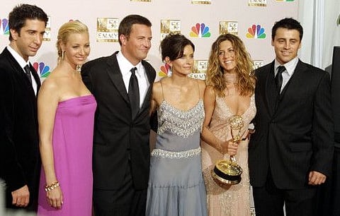 In this file photo cast members from "Friends," which won Outstanding Comedy, series pose at the 54th Annual Emmy Awards at the Shrine Auditorium in Los Angeles 22 September 2002.