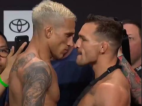 Michael Chandler and Charles Oliviera face off at the UFC 262 weigh-in