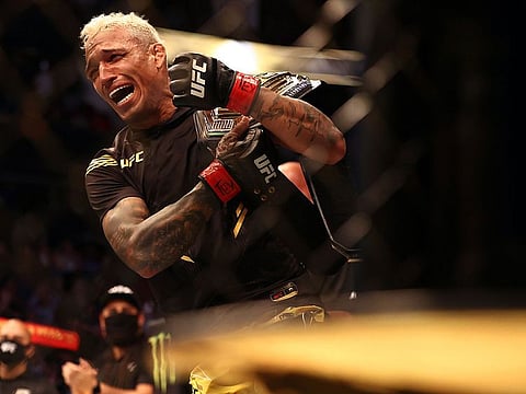 Charles Oliveira celebrates after defeating Michael Chandler during UFC 262 at Toyota Center. Mandatory Credit: Troy Taormina-USA TODAY Sports