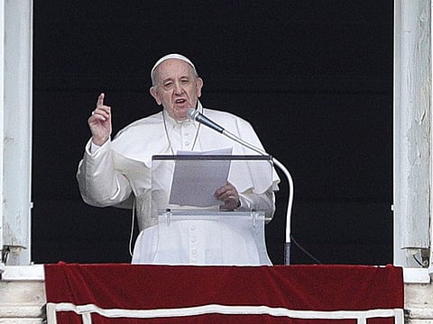Pope Francis delivers his message during the Angelus noon prayer in St. Peter's Square at the Vatican, Sunday, May 16, 2021.