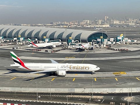 Emirates airlines are seen on the tarmac in a general view of Dubai International Airport