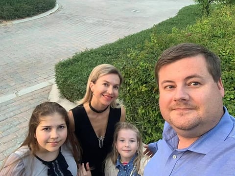 Belgian expatriate Gert Kloeck (extreme right), the latest Dubai Duty Free lucky draw winner, with family.