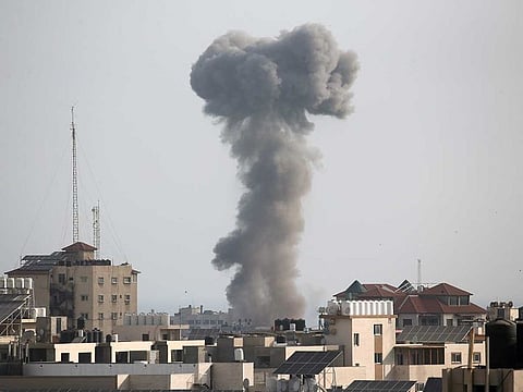 Smoke rises following an Israeli air strike in Gaza.