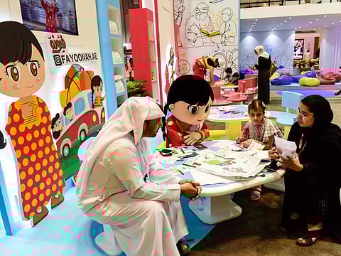 Visitors at the Abu Dhabi International Book Fair during the 2019 edition.