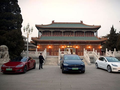 File photo: Tesla vehicles are parked outside a building at the Zhongnanhai leadership compound in Beijing.