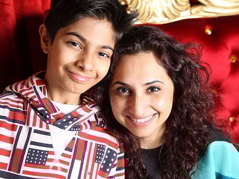 Moksh Parwani and his mother.