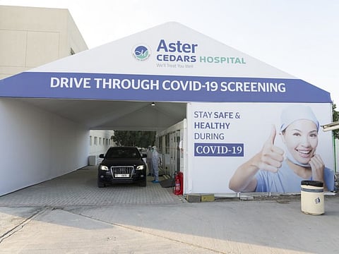 An Aster Hospital & Clinic drive through COVID-19 test centre. The procedure takes less than 10 minutes.