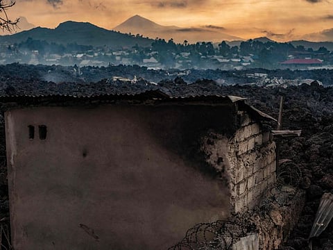 This general view shows a structure still standing, surrounded by the lava who flew during the eruption on May 23, 2021.