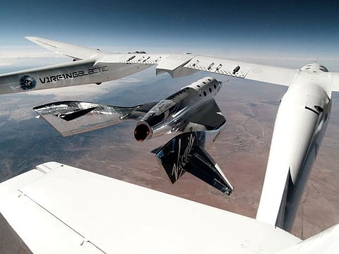 Virgin Galactic's VSS Unity, piloted by CJ Sturckow and Dave Mackay, is released from its mothership, VMS Eve, on the way to its first spaceflight after launch from Spaceport America, New Mexico, U.S. May 22, 2021 in a still image from video.