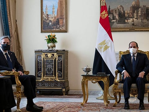 US Secretary of State Antony Blinken (left) meets with Egypt's President Abdel Fattah Al Sisi at the Heliopolis Presidential Palace on May 26, 2021.
