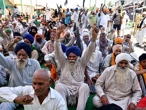 Farmers shout slogans during a protest against the farm laws at Singhu Border, Delhi (File)