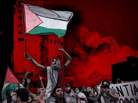 Palestinians celebrate after Israel and Hamas agreed to a ceasefire ending the latest round of violence in Gaza