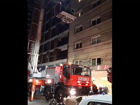 Rentistas midfielder Francisco Duarte is rescued from the hotel in Buenos Aires