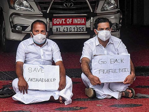 MPs Hibi Eden and TN Prathapan protest demanding the Indian president to urgently call back the administrator Praful Khoda Patel, in front of the Lakshadweep Administration office in Kochi, Wednesday, May 26, 2021.